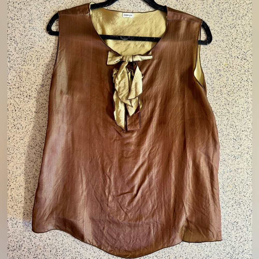 Chan Luu 100% silk handmade brown top with green bows.Size Large